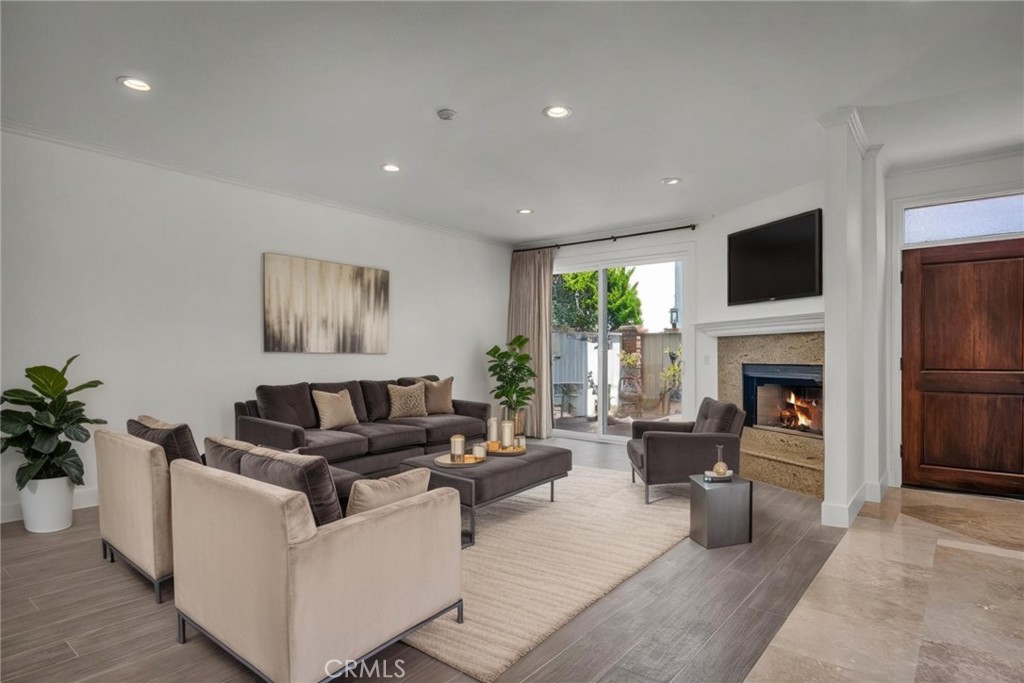 UNBEATABLE LOCATION | ONE BLOCK TO THE BEACH | BEST VALUE WEST OF PCH!
Just one block from the sand and located in one of South Redondo Beach’s most desirable neighborhoods west of Pacific Coast Highway, 1205 S Catalina Ave, Unit A, offers an exceptional blend of space, style, and coastal lifestyle. With nearly 2,500 sq. ft. of living space, this end-unit townhome is one of the lowest price-per-square-foot opportunities west of PCH—an ideal find for savvy buyers and long-term investors alike.
Tucked away with a private entrance off Catalina Ave and sharing only one wall, this 3-bedroom, 4-bathroom home provides a rare level of privacy just moments from the beach.
The main level features a beautifully remodeled kitchen with quartz countertops, stainless steel appliances, custom soft-close cabinetry with pull-outs, and a cozy breakfast nook. The formal dining area flows effortlessly into a bright and spacious living room with recessed lighting, a gas fireplace, custom dry bar with wine fridge, and sliding doors that open to a private patio for seamless indoor-outdoor living. A convenient half bath is located on this level for guests.
Downstairs you'll find an oversized bonus room with a window for natural light, built-in wall shelving, a large closet, and an adjacent three-quarter bathroom—offering endless flexibility as a home office, media room, guest suite, or potential fourth bedroom.
Upstairs, discover three generously sized bedrooms, including a luxurious primary suite with vaulted ceilings, a private balcony, walk-in closet with custom built-ins, and a spa-inspired ensuite with dual sinks, a soaking tub, and a separate shower. Two additional bedrooms share a full bath, and the convenient upstairs laundry adds everyday ease. An abundance of storage spaces enhances the home’s livability.
Additional highlights include air conditioning, a freshly painted interior, a private two-car garage with extra storage, and a location that’s just minutes from the shops, dining, and charm of the Hollywood Riviera.
Offering an UNBEATABLE LOCATION, EXCEPTIONAL VALUE, and coastal living at its finest—this is a rare opportunity you don’t want to miss.