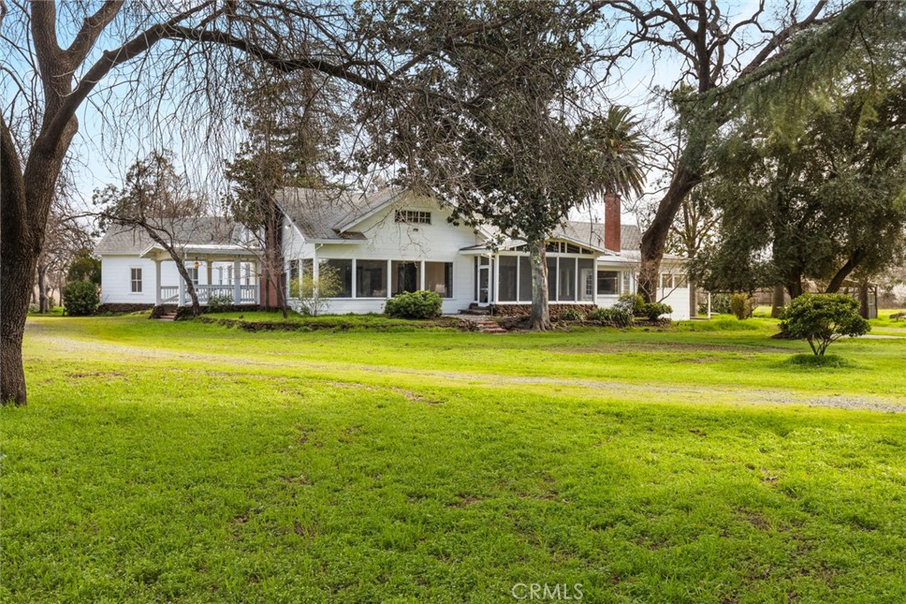 40 Acres in Chico – A Historic Craftsman with Endless Potential!
Step back in time with this rare 1920s Craftsman estate, set on 40 acres just one parcel from Chico city limits. From the grand front porch to the stately brick fireplace, this home is filled with original character—coffered wood ceilings, built-ins, pocket doors, and vintage fixtures that tell nearly a century of stories. Highlights include:
Expansive living room with floor-to-ceiling windows - -Show stopping formal dining room for unforgettable gatherings - - Spacious basement—ideal for storage, a workshop, wine cellar, or extra living space - - Towering palm tree–lined entrance that sets the stage for this unique property
The land offers even more possibilities with a guest house ready for revival and a rustic barn that could transform into storage, an event venue, or a creative project. With a little vision, this estate could become your private retreat, working homestead, or legacy property for generations to come. Don’t miss your chance to own a piece of Chico’s history—opportunities like this don’t come around often!