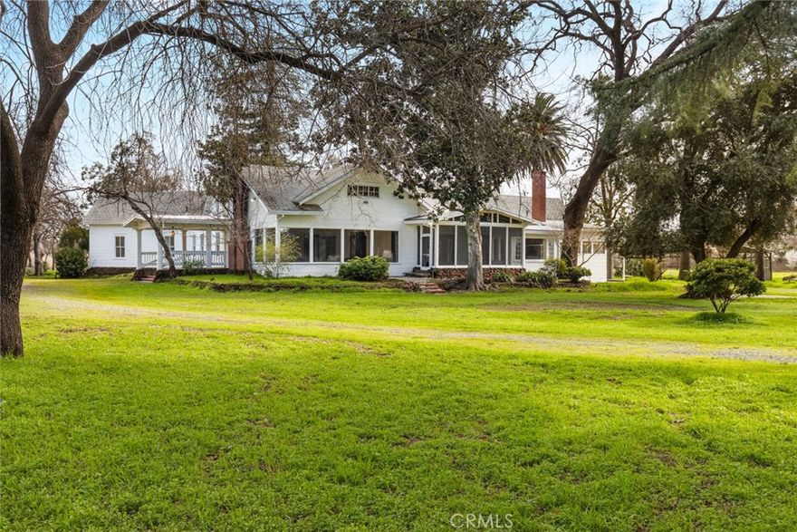 40 Acres in Chico – A Historic Craftsman with Endless Potential!

Step back in time with this rare 1920s Craftsman estate, set on 40 acres just one parcel from Chico city limits. From the grand front porch to the stately brick fireplace, this home is filled with original character—coffered wood ceilings, built-ins, pocket doors, and vintage fixtures that tell nearly a century of stories. Highlights include:

Expansive living room with floor-to-ceiling windows - -Show stopping formal dining room for unforgettable gatherings - - Spacious basement—ideal for storage, a workshop, wine cellar, or extra living space - - Towering palm tree–lined entrance that sets the stage for this unique property

The land offers even more possibilities with a guest house ready for revival and a rustic barn that could transform into storage, an event venue, or a creative project. With a little vision, this estate could become your private retreat, working homestead, or legacy property for generations to come. Don’t miss your chance to own a piece of Chico’s history—opportunities like this don’t come around often!