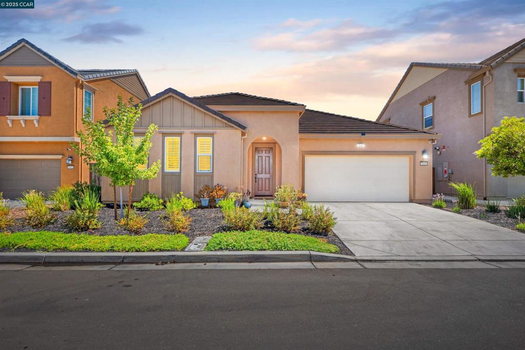 Welcome to this beautifully maintained single-story smart home built in 2021, offering 3 bedrooms, 2 bathrooms, and 1,656 sq. ft. of living space. The open-concept design features a stylish kitchen with granite countertops, an oversized island, espresso cabinetry, stainless-steel appliances, and a sleek subway tile backsplash, all flowing seamlessly into the dining and living areas. The spacious primary suite includes a walk-in closet and private bath, while the secondary bedrooms are thoughtfully tucked away for comfort and privacy. Tile flooring runs through the main living areas, with plush carpet in bedrooms for added warmth. Owned solar helps keep utility costs low, while a landscaped front yard, low-maintenance backyard, and covered entry enhance curb appeal. Additional highlights include an attached two-car garage, smart home technology, energy-efficient features, and community HOA upkeep. Located within the Brentwood school district and close to parks, shopping, and commuter routes, this move-in-ready home is the perfect blend of style and function.