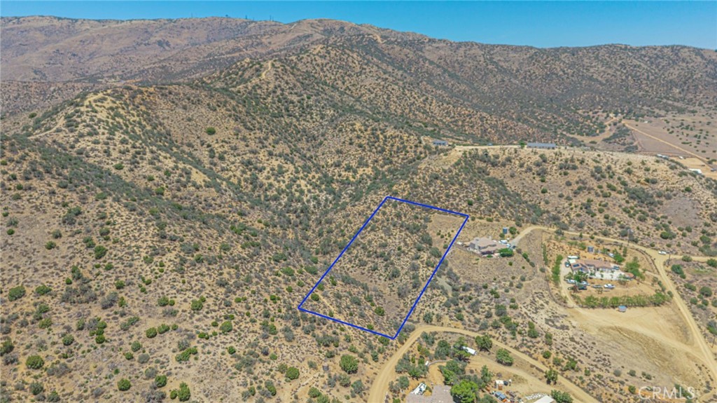 Seize the opportunity to own this exceptional A-2-2 zoned parcel, featuring stunning panoramic views and easy access to the freeway. This property comes with fully approved building plans—saving you time and bringing you one step closer to creating your custom retreat. Whether you're ready to build your forever home or seeking a smart land investment, this Acton gem offers endless potential.