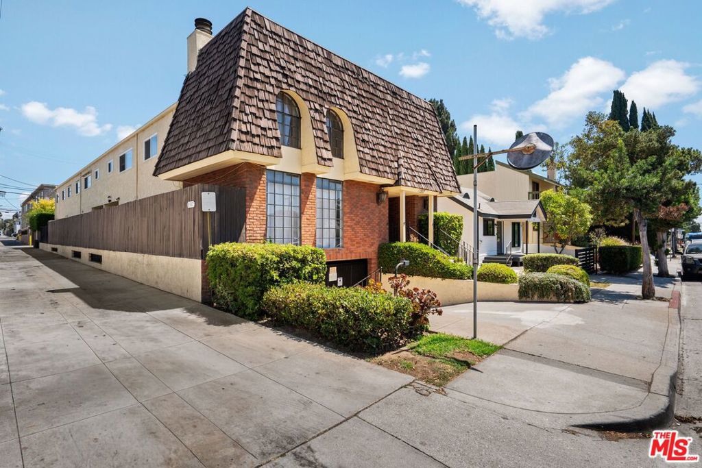 Prime Santa Monica Townhouse: Stylish, Spacious, and Move-In Ready. Perfectly situated in a highly sought-after Santa Monica location, this beautifully updated townhouse offers the ideal blend of comfort, style, and convenience. Whether you're downsizing from a larger home or purchasing for the first time, this residence is designed to meet your needs. Featuring a well-planned layout with 3 bedrooms and 2.5 baths, the home boasts a bright and spacious living room with a cozy fireplace, a designated dining area with sliding doors leading to a private patio, and a showcase interior with fresh paint and gleaming oak hardwood floors throughout. The updated kitchen and bathrooms, along with stainless steel appliances, give the home a modern, move-in-ready appeal. With only five residences in the complex, enjoy a sense of privacy and community, plus subterranean parking with two side-by-side spaces. HOA dues are just $400 per month. This is a must-see opportunity in one of Santa Monica's most desirable neighborhoods priced to sell and ready to welcome its new owners.