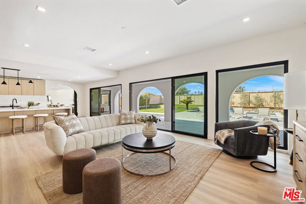 Desert Escape! This fully remodeled 2,700 sq ft home features a formal living room and a separate family room, offering a harmonious blend of style, comfort, and entertainment. Step inside to discover four spacious bedrooms and three luxurious bathrooms, providing ample space for both relaxation and entertaining. The open-concept layout creates a seamless flow between the kitchen, family room, and dining area is perfect for everyday living and special gatherings. Every detail has been thoughtfully curated to enhance your living experience, with modern finishes infused with a warm Mediterranean vibe, bringing both elegance and character to the space. Enjoy easy access to shops, restaurants, and desert activities, making this home a perfect blend of comfort and convenience. Month-to-month only lease option.