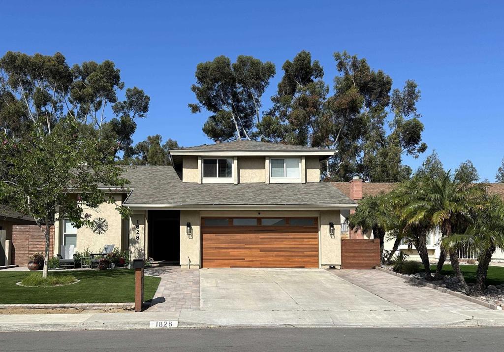 No detail has been overlooked in this beautifully furnished and updated home in the quiet pocket neighborhood of Coronado View Estates. Fabulous, bright interior with vaulted ceilings, laminate flooring, and bedroom and full-bath on the entry level. Large open kitchen features white cabinetry, butcher block counters, and stainless-steel appliances. The convenient laundry room is located right off the kitchen. Upstairs are three bedrooms and two fully remodeled baths. The backyard is low maintenance and is an entertainer's dream space. The covered dining and firepit areas were designed for outdoor gatherings of friends and family. Two-car direct entry garage with storage space and electric car charger. The property backs to Emerald Hills Park with large expanses of grassy areas and great community facilities. No detail has been overlooked in this beautifully furnished and updated home in the quiet pocket neighborhood of Coronado View Estates. Fabulous, bright interior with vaulted ceilings, hardwood floors, and bedroom and full-bath on the entry level. Large open kitchen features white cabinetry, butcher block counters, and stainless-steel appliances. The convenient laundry room is located right off the kitchen. Upstairs are three bedrooms and two fully remodeled baths. The backyard is low maintenance and is an entertainer's dream space. The covered dining and firepit areas were designed for outdoor gatherings of friends and family. The property backs to Emerald Hills Park with large expanses of grassy areas and great community facilities.