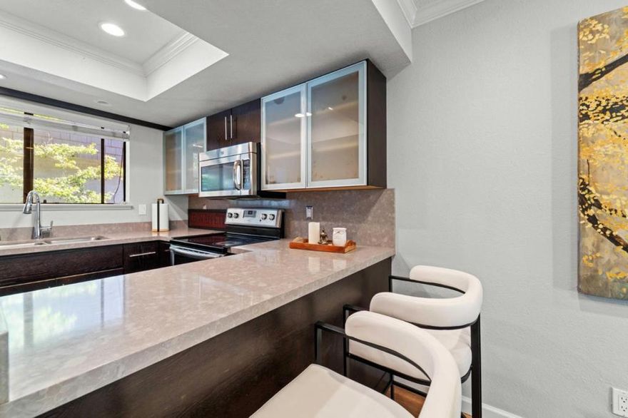 Welcome to this modern 2 bed/ 2.5 bathroom - situated in the desirable city of Campbell/Bordering Los Gatos and San Jose. Spacious and Bright!  This property features a well-appointed kitchen equipped with modern amenities, quartz countertops, nearly new stainless steel appliances.. The home boasts beautiful flooring throughout. The living area is complemented by a cozy fireplace, ideal for relaxation. The functional layout includes a breakfast bar and a dining area in the living room, creating an inviting space for meals. A deck in the back and front giving you indoor outdoor living space. Convenient inside laundry fitted with a washer and dryer. Additional amenities include a security gate for added peace of mind. The prized Cambrian Elementary School District zone. Residence is an excellent opportunity to enjoy Campbell's vibrant lifestyle while easy access to Apple, Meta, Nvidia & Google