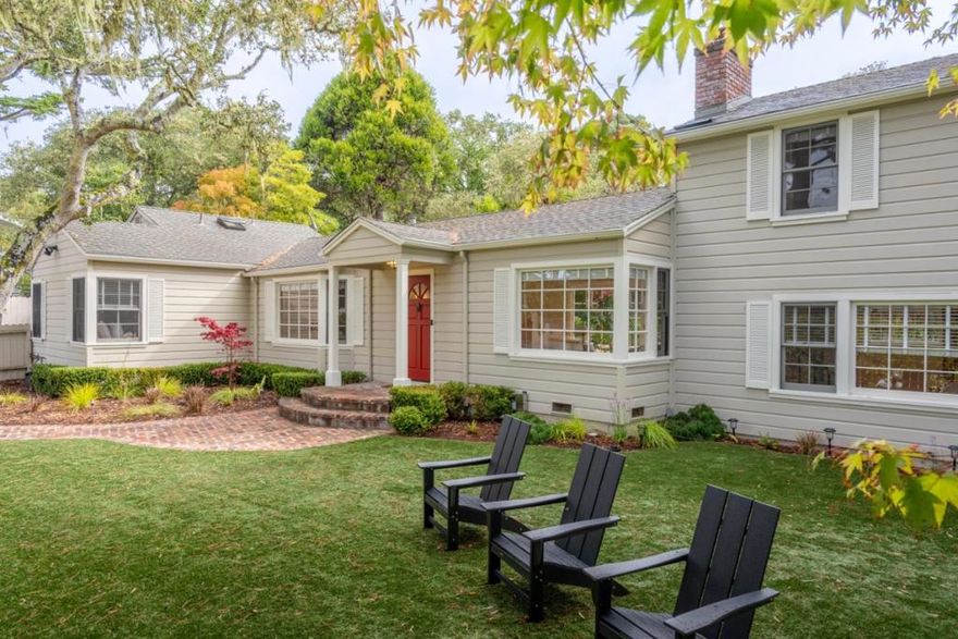 Welcome to 24587 Castro Lane, a true gem in the coveted Carmel Woods neighborhood. This remarkable and beautifully updated home offers a perfect blend of elegance and comfort, set on an expansive lot that promises privacy and tranquility. Designed with entertaining in mind, the open floorplan seamlessly connects the living spaces. The expansive family room, with its striking brick fireplace and rustic wood beams, sets the stage for memorable gatherings. In the living room, a beautiful Carmel stone fireplace adds a touch of sophistication, complemented by rich hardwood floors that run throughout the home. The gourmet kitchen is a chef's dream, featuring top-of-the-line appliances and luxurious Calcutta marble countertops. Every detail speaks of quality, from the high ceilings to the premium hardware and fixtures. This spacious home boasts four bedrooms, including a primary suite. Relax in the jacuzzi or enjoy the serene surroundings of mature landscaping that enhances the property's natural beauty. Located just 3/4 mile from Ocean Avenue and a mile from the sandy shores of Carmel Beach, this home offers the perfect combination of coastal charm and luxurious living.
