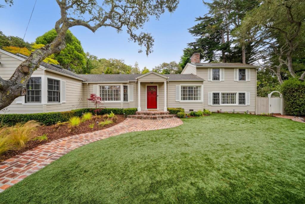 Welcome to 24587 Castro Lane, a true gem in the coveted Carmel Woods neighborhood. This remarkable and beautifully updated home offers a perfect blend of elegance and comfort, set on an expansive lot that promises privacy and tranquility. Designed with entertaining in mind, the open floorplan seamlessly connects the living spaces. The expansive family room, with its striking brick fireplace and rustic wood beams, sets the stage for memorable gatherings. In the living room, a beautiful Carmel stone fireplace adds a touch of sophistication, complemented by rich hardwood floors that run throughout the home. The gourmet kitchen is a chef's dream, featuring top-of-the-line appliances and luxurious Calcutta marble countertops. Every detail speaks of quality, from the high ceilings to the premium hardware and fixtures. This spacious home boasts four bedrooms, including a primary suite. Relax in the jacuzzi or enjoy the serene surroundings of mature landscaping that enhances the property's natural beauty. Located just 3/4 mile from Ocean Avenue and a mile from the sandy shores of Carmel Beach, this home offers the perfect combination of coastal charm and luxurious living.