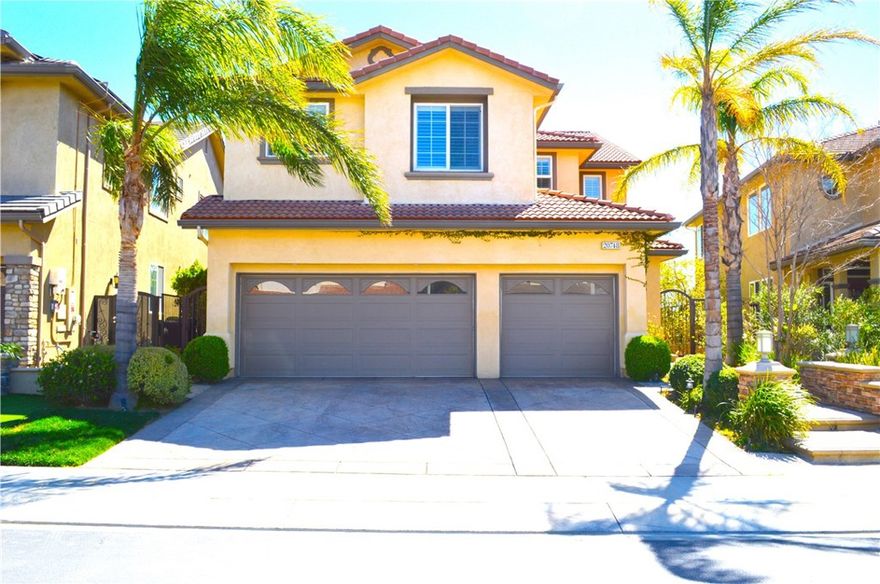 Welcome to this immaculate, partially furnished view home in the prestigious 24-hour guard-gated community of "SORRENTO". Perched on a prime lot with sweeping panoramic views of the San Fernando Valley, this beautifully upgraded residence offers over 3,300 sq. ft. of living space designed for both comfort and style. The main floor features a versatile bedroom/office with a full bath, plus an additional guest powder room. Entertain in the elegant formal living and dining rooms, or enjoy the open-concept family room seamlessly connected to the modern chef’s kitchen with updated finishes. Upstairs, four spacious bedrooms provide room to retreat and recharge, while solar power ensures energy efficiency. Step outside to your private backyard oasis—equally perfect for peaceful relaxation or lively gatherings. With a covered patio, built-in BBQ, and outdoor fireplace, you’ll enjoy year-round entertaining while soaking in unforgettable sunsets and even fireworks displays from Burbank to Woodland Hills. The home is zoned for the highly sought-after Porter Ranch Community School (TK–8). Just minutes away, discover scenic parks, hiking trails, Porter Valley Country Club, and premier shopping and dining at The Vineyards at Porter Ranch. With convenient access to the 118, 405, 5, 210, and 170 freeways, you’ll be seamlessly connected to the best of Los Angeles. This turnkey, spacious home truly has it all—views, location, and lifestyle. Don’t miss the chance to make Porter Ranch your next home.
