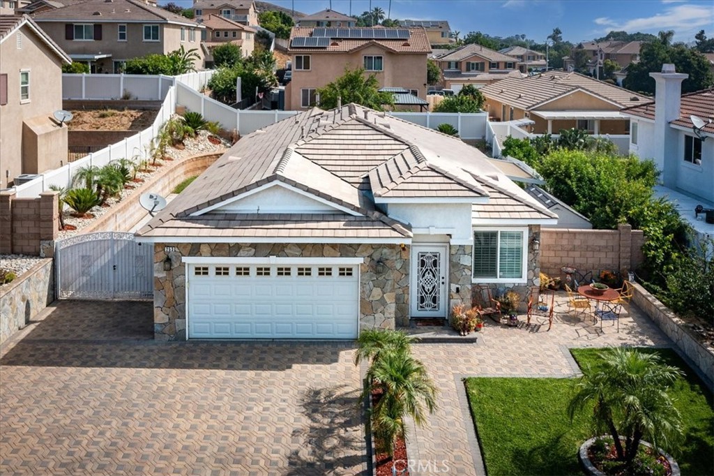 Welcome to your ideal sanctuary—a stunning single-family home nestled in a tranquil cul-de-sac that blends modern elegance with comfort and practicality. This delightful residence, built in 2009, boasts 4 spacious bedrooms and 2 well-appointed bathrooms, perfectly designed for your lifestyle.
As you enter, you are greeted by glorious high ceilings that create an airy atmosphere. The open layout features a cozy family room, ideal for relaxation around the elegant fireplace, and a dining area that flows seamlessly into the gourmet kitchen. Delight your inner chef with granite countertops, complemented by a pantry for optimal storage. Plantation shutters adorn the windows, allowing abundant natural light while ensuring privacy.
Step outside to discover a spacious backyard patio, perfect for entertaining or simply enjoying peaceful evenings under the stars. The beautifully landscaped yard is a serene retreat, providing ample room for outdoor activities. Additional features include RV parking, a two-car garage with built-in cabinetry, and inviting walkways that enhance curb appeal.
The thoughtful design extends throughout the home with laminate wood-look flooring, recessed lighting, and central air and heating for year-round comfort. Located close to sidewalk-lined streets and well-lit for an enjoyable evening stroll, this home is a true gem in a welcoming suburban community. Don’t miss the opportunity to make this exquisite residence your own!