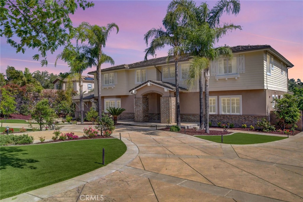 Come Drive by and see a rare gem nestled in one of Claremont’s most prestigious and sought-after neighborhoods!
Where Modern Elegance Meets Timeless Living in Claremont’s Most Coveted Cul-De-Sac.
Welcome to 972 Olympic Court,—positioned perfectly to capture stunning mountain views, all while being tucked away from power lines and fire zones. This extraordinary estate, originally built in 2021, has been completely reimagined in 2025 with top-tier luxury finishes, blending modern design with enduring quality.
Spanning 6 bedrooms, 6 full bathrooms, and over 5,300 square feet of living space, this home offers a brilliant layout perfect for multi-generational living, entertaining, or raising a family and has never seen the market with the home owned by original owners. Inside, you’ll be captivated by the soaring vaulted ceilings, expansive windows that flood the home with natural light, and a layout that reflects perfect Feng Shui and intentional craftsmanship at every turn.
The chef’s kitchen has been upgraded with newly refinished cabinetry and gleaming granite countertops, creating a seamless flow into the main living and dining areas. Fresh interior and exterior paint elevate the home’s elegance, while updated hardwood and laminate flooring add warmth and style throughout. Recessed lighting, custom woodwork, and detailed finishes elevate each room with modern sophistication.
Step outside to your private resort-style oasis featuring a newly upgraded pool and spa with enhanced equipment, surrounded by a lush landscape curated with mature fruit and citrus trees, majestic succulents, and a manicured yard enhanced with front and backyard AstroTurf and custom hardscape. The 4-car detached garage and dual primary suites—one on each level—make this a perfect haven for extended families or guests.
Set on a 27,016 sq ft lot, this estate offers space, privacy, and unmatched curb appeal—situated within Claremont’s top-rated school district. Offered for the first time by the original owners who have lovingly maintained and improved every inch of the property, this is more than a home—it’s a rare opportunity to own a legacy in Claremont’s finest location