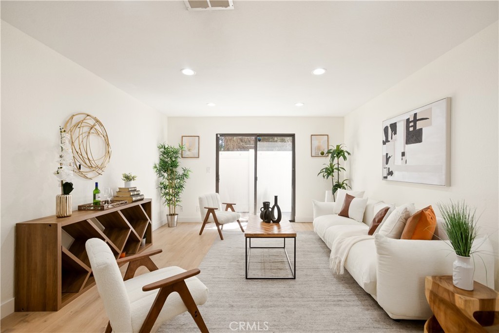 Welcome to this beautifully updated 2-bedroom, 2-bathroom condo located in a secure, gated community in the heart of Van Nuys. This light-filled, two-story home features an open floor plan with sleek modern finishes throughout. The spacious living and dining areas flow seamlessly into a contemporary kitchen, complete with updated cabinetry and marble countertops, with a private patio—perfect for entertaining or everyday living.
Upstairs, you'll find two generously sized bedrooms and two fully renovated bathrooms offering a clean, sophisticated style. The upgraded hardwood flooring throughout adds a cohesive, elegant touch to the entire space.
Enjoy the peace of mind that comes with two tandem parking spaces in a gated garage, as well as the convenience of being just minutes from local shops, popular restaurants, and the beautiful Anthony C. Beilenson Park.
Community amenities include two outdoor grilling areas, a charming well-lit courtyard with tranquil fountains, and lush landscaping—creating a relaxing, resort-style atmosphere right at home.
Don’t miss your chance to own this turnkey condo in one of the Valley’s most convenient and vibrant neighborhoods!
Buyer to verify all MLS info, including permits, bed/bath counts, square footage, and school availability. Buyer is advised to investigate all aspects of the property & verify the accuracy of all information provided.