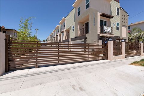 Photo of 11845 Grevillea Ave #7, Hawthorne, CA 90250 (MLS # SB26031171)
