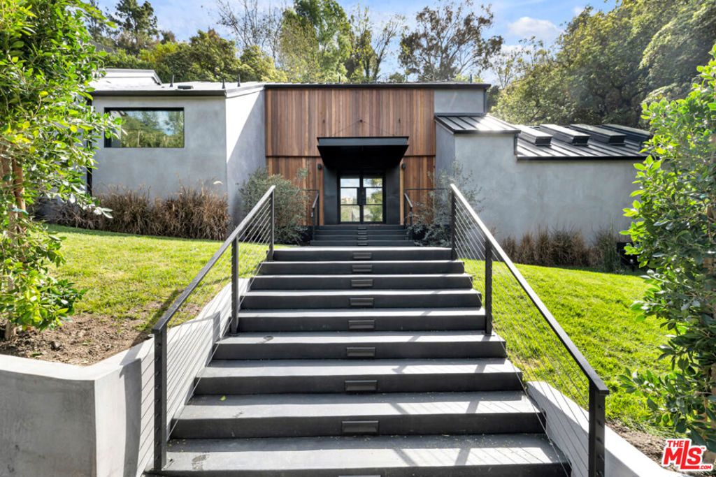 Photo of 10560 Dolcedo Way, Bel Air, CA 90077 (MLS # 25564271)