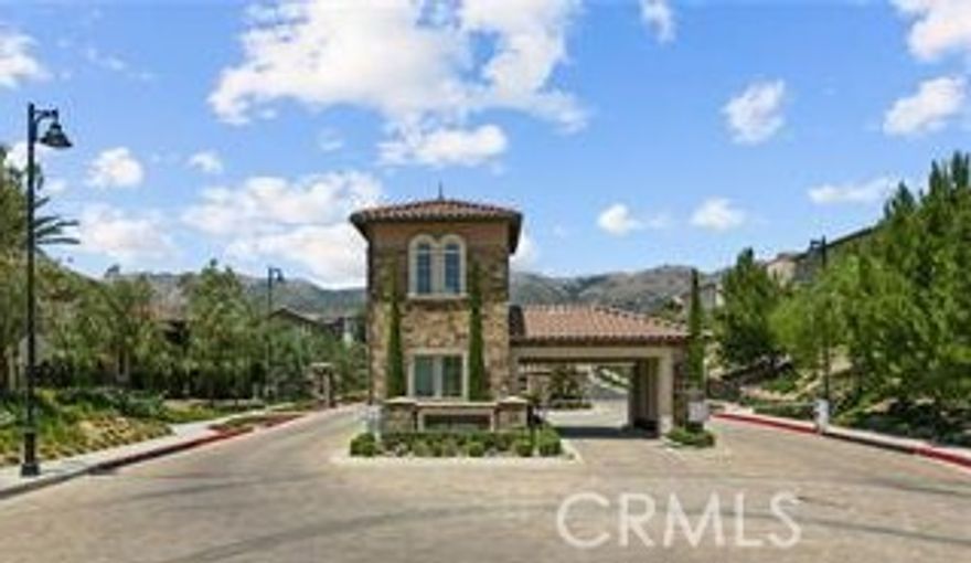 Stunning 4-Bedroom + Loft Home in Guard-Gated Toll Brothers Community – Available Now!Located in the prestigious, 24-hour guard-gated Toll Brothers " Canyons" community in the heart of newly developed Porter Ranch, this spacious 4-bedroom, 3-bathroom home with a 2-car garage was built in 2021 and is move-in ready! New luxury vinyl plank flooringhas just been installed on the staircase, upstairs bedrooms, and loft areas.

The thoughtfully designed floor plan features a gourmet kitchen with a center island and breakfast bar, stainless steel appliances, and a convenient downstairs bedroom and full bathroom—ideal for guests or multi-generational living. The open-concept living area is filled with natural light from expansive windows that overlook the low-maintenance backyard, complete with artificial turf and a concrete patio—perfect for outdoor relaxation.

Upstairs, the primary suite is thoughtfully separated from the other bedrooms and offers a luxurious en-suite bathroom with dual sinks, a soaking tub, separate shower with built-in seating, and a spacious walk-in closet. The versatile loft space is ideal for a home office, media room, or study area, and the large upstairs laundry room adds extra convenience. Enjoy resort-style amenities including a new community pool, clubhous, all just moments away. Top-rated Porter Ranch schools and a brand new community park complex are nearby as well as 2 shopping centers, and easy freeway access complete the package. Don’t miss out on this exceptional lease opportunity!