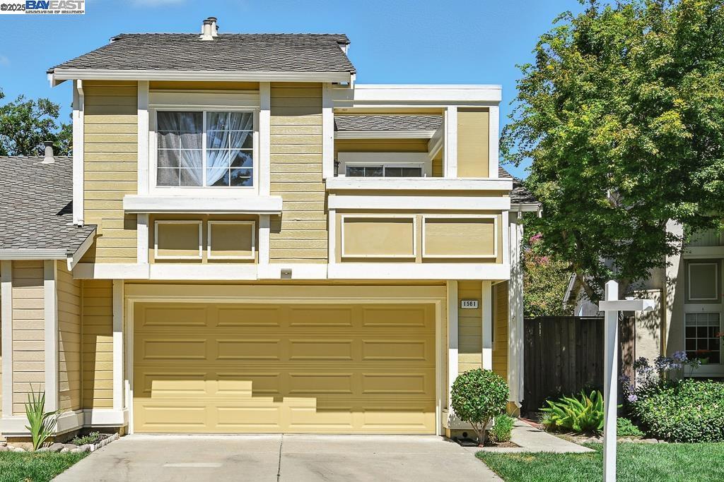 This west-facing 3-bedroom, 2.5-bath home offers 1,731 sq. ft. of inviting living space with vaulted ceilings in the sought-after Danbury Park community. The recently remodeled kitchen showcases quartz countertops, an induction cooktop, stainless steel appliances, and recessed lighting. Upstairs, the primary suite includes a brand-new bathroom with dual vanities, a soaking tub, and a spacious walk-in closet, while two guest bedrooms open to a private patio. The low-maintenance paved backyard provides a private retreat for outdoor enjoyment. Ideally located just minutes from top Pleasanton schools, parks, dining, BART, downtown Pleasanton, and major freeways, this move-in ready home offers both comfort and exceptional convenience.