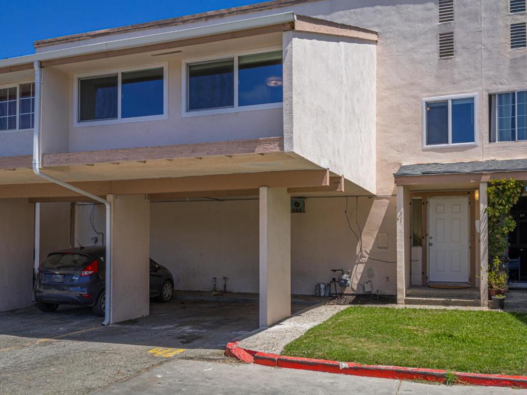 Move-in ready and full of modern updates, this spacious 4-bedroom home, located in one of the most desirable areas of the complex, is ready to welcome its next owner. The generous layout includes a large primary suite with the potential to be divided - perfect for adding a 5th bedroom, home office, or flex space to suit your needs. The interior features fresh paint, charming faux wood blinds, and a brand-new stove, all contributing to a clean, contemporary feel. Both bathrooms have been tastefully renovated with stylish new vanities, mirrors and lighting. Throughout the home, gorgeous luxury plank vinyl flooring provides a sleek, cohesive look that's both durable and attractive. Ideal for a growing household or anyone in need of adaptable living space, this home offers comfort, functionality, and a great value. There is one assigned carport directly in front of the unit and a dedicated second space as well. Conveniently located near schools, shopping, and major commuting routes. Don't miss this opportunity to own a beautifully updated, versatile home in a prime location.