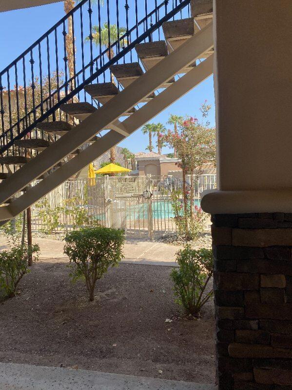 Ready for immediate occupancy. Perfect for single person or couple. Welcome home to Casitas Las Rosas. Great condo located across from Old Town La Quinta. Beautiful one bedroom, one bath situated on the second floor with easy access to pool and spa. fully furnished. Walk in closet is over-sized. The kitchen is well appointed with stove, microwave, fridge/freezer, granite counter tops. Bath is generous in size with tub/shower combo, granite counter tops. The laundry closet has stacked washer and dryer. Water, trash, internet, cable TV included. Ideally located in the heart of La Quinta. Super location and access to pool.