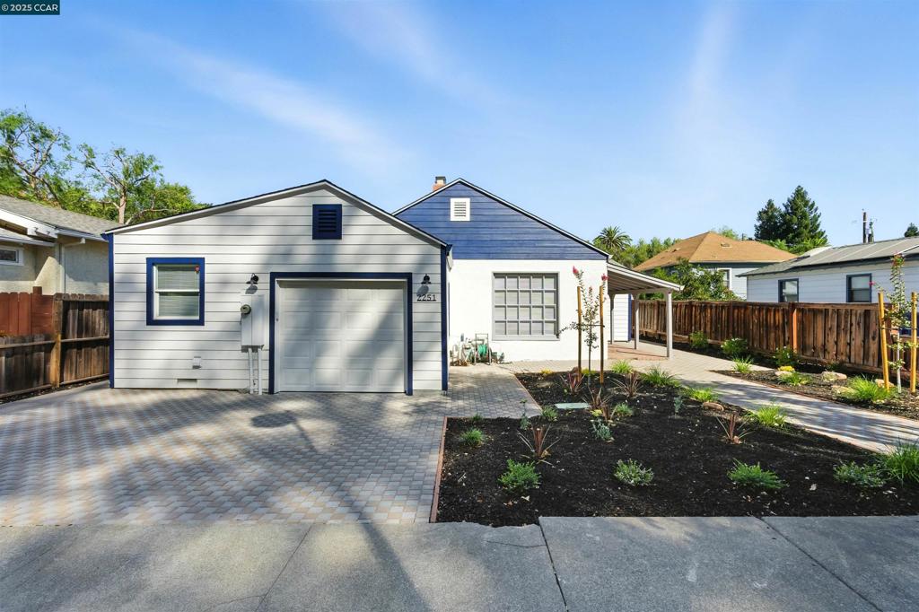 Welcome to 2251 Pacheco St, an extensively remodeled 2BD/2.5BA home (1,287± SF) with a permitted 450± SF detached flex space, just minutes from Downtown Concord. Step inside to new vinyl floors, fresh interior/exterior paint, and a modern electric fireplace. The kitchen shines with quartz counters, stainless steel appliances, and soft-close cabinetry. Retreat to the primary suite featuring a custom-tiled shower with sliding glass door. A spacious laundry room with sink and storage adds everyday convenience. Major upgrades include new roof, plumbing, HVAC + heat pump, water heater (2023), and French drain system for long-term protection. Outdoor living is effortless with new front and backyard pavers, plus a new concrete pad, perfect for entertaining or play. The detached flex space, wired for electricity and ceiling fan, is ideal for a home office, gym, or guest retreat. Near shopping, dining, parks, and BART, this move-in-ready home offers comfort, style, and peace of mind in the heart of Concord. Imagine weekend strolls to Todos Santos Plaza, dining at local favorites, or an easy BART ride into the city. This home makes it all possible. Relax, entertain, and thrive in a home designed for modern living. A rare find in a sought-after neighborhood, ready to welcome you home today.
