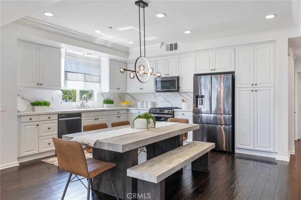 Welcome to this beautifully updated townhome in the highly sought-after ThreeSixty at South Bay community. The updated 3-bedroom, 3-bathroom home is one of the larger floor plans in the community offering the perfect blend of privacy and flexibility. This south-facing residence features a bedroom and full bath on each level.
The main living area is bathed in natural light, showcasing soaring two-story ceilings and an open-concept design that flows seamlessly from the living room, dining area to the upgraded kitchen with beautiful new quartz countertops all leading out your private balcony, perfect for grilling, morning coffee, or winding down at the end of the day.
Downstairs, the ensuite bedroom boasts its own private patio surrounded by lush landscaping and a private entrance. It is a great flex space for roommates, guests, or multigenerational living. As you head upstairs you are delighted by the spacious primary suite, which includes a large walk-in closet, a luxurious bathroom with dual vanities, soaking tub, and separate shower. A versatile loft space is perfect for a home office, reading nook, or play area.
ThreeSixty at South Bay is a gated, resort-inspired community offering exceptional amenities: two heated pools, spa, fitness center, sports court, clubhouse, BBQ area, playground, green spaces, and dog parks. Located in the award-winning Wiseburn School District and near Da Vinci Charter Schools, this home is also minutes from beaches, SoFi Stadium, LAX, freeways, and top employers like SpaceX, Northrop Grumman, Raytheon, Lockheed Martin, Mattel, to name a few.
Don’t miss this exceptional opportunity in one of the South Bay’s most coveted communities!
