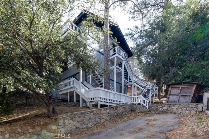 Charming Crestline Mountain Retreat - Dual Units with endless possibilities. Units 1 and 2 a delighful mountain property nestled in the serene community of Crestline, CA comes with two bedrooms and one full bathroom each level.  This unique home offers two separate living spaces, perfect for multi-generaltional living, a vacation getaway with guest accommodations, or income-producing rental potential.  Each unit features its own private entrance and comfortable layout, providing privacy and flexibility for residents or guests.  The basement level is separate and has no interior access to the upper levels, ensuring true independence between living spaces.  Located just minutes from Lake Gregory, this home offers easy access to outdoor recreation, dining, and shopping in Crestline's charming mountain village.  Also, conveniently close to Lake Arrowhead and the City of San Bernadino with the best of Southern California just a drive away from Disneyland and the beaches. Whether you're seeking a peaceful mountain retreat or a smart investment opportunity, this Crestline property blends convenience, comfort, and natural beauty in one ideal location.