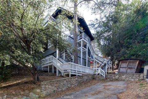 Photo of 129 Zermatt Drive #1 & 2, Crestline, CA 92325 (MLS # CV25231515)