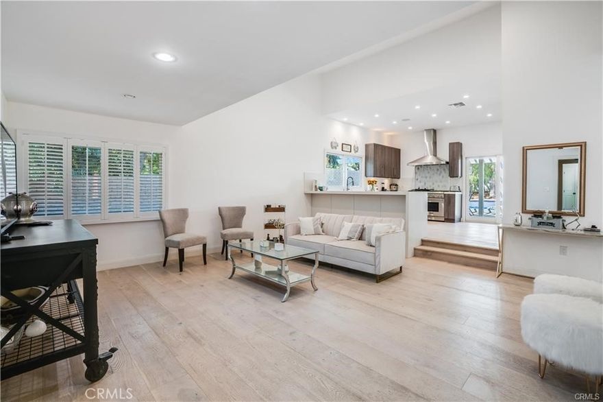 Single story gem is located behind the gates of the highly desirable exclusive & private guard gated community of Hidden Hills. This elegant Farm Home is perfect for entertaining. Fall in love the moment you step inside. The home is gorgeous & recently updated with luxury touches throughout. Modern & hip. Backyard oasis with a sparkling pool, outdoor Bbq, sports court & more. Recessed lighting, wood floors, Chefs gourmet kitchen with granite counters, top of the line appliances including a Thermador Refrigerator and glass wine panty. Large open floor plan offering 3726 sq ft with 6 bedrooms & 4 baths. Light & bright with windows galore. Home comes equipped with SONOS Smart Home Technology & RING Home Security System.  Save money with fully paid off Solar Panels. Huge lot on 1.31 Acres with plenty of room to add on or to add an ADU/Guest House. Large private driveway and additional lot next door. Hidden Hills amenities include an Equestrian Center with a riding arena, community center, tennis court, pool, movie theater & more.