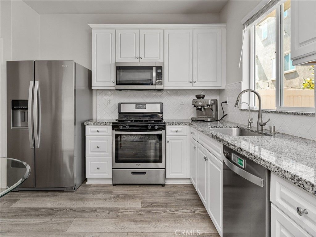 Photo of 11819 Verona Lane, Los Angeles, CA 90047 (MLS # SB26053529)