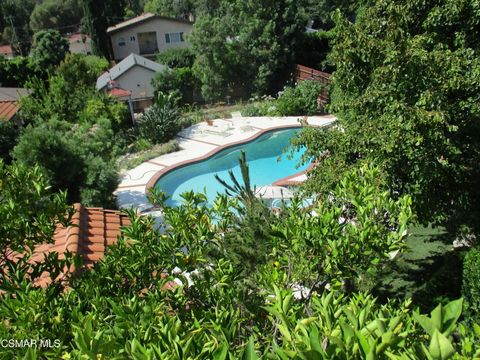 Photo of 5042 Llano Drive, Woodland Hills, CA 91364 (MLS # 226000624)