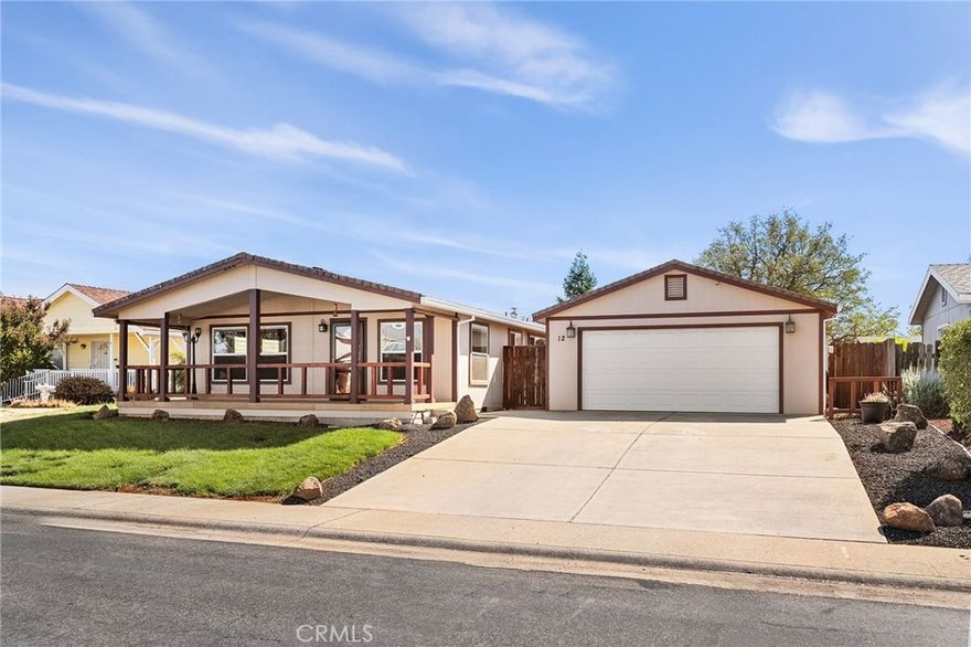 Charming & Meticulously Maintained Home in a Gated Community! Step into this beautifully maintained 3 bedroom, 2 bathroom home where comfort meets style. Vaulted ceilings, ceiling fans, and custom lighting create an inviting atmosphere throughout the open living, dining, and kitchen areas. The kitchen is a chef’s dream with a 5-burner gas stove, granite countertops, a deep new sink, and elegant cabinets with glass doors.



The master suite is a true retreat with a walk-in closet, soaking tub, and separate shower. Laundry is conveniently located in a dedicated room, and the large two car garage provides ample parking and storage.



Enjoy outdoor living in the lush front yard featuring charming shrubs, automatic sprinklers, rock dry creek beds, and a covered courtyard-style lanai. The fully fenced backyard offers gated side access and plenty of space for entertaining or relaxing in privacy.



Additional upgrades include newer carpet, fresh paint, updated ducting, gutters with French drain, a new garbage disposal, water heater, and AC. Located in a clean, quiet gated community less than a mile from downtown, shopping, dining, and recreational options, this home combines character, modern comforts, and an unbeatable​​‌​​​​‌​​‌‌​​‌​​​‌‌​​​‌​​‌‌​​​‌​‌​​​‌‌​ location.