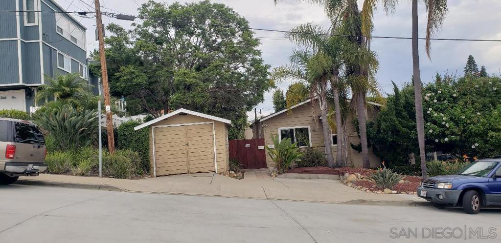 Investor or Developer Opportunity! Unique property in the lovely community of Point Loma. Two units on 1 lot! Bring your creative design ideas as this property offers many development possibilities. The front house is a 2 bedroom 2 bath 1,050 estimated square feet and the back house is a 1 bedroom 1 bath 400 estimated square feet. Lot size is 5,177 square feet. Recent notable upgrades include full replacement of the sewer line, new siding and new exterior deck flooring. Plenty of storage space in the 1 car detached Garage with additional parking available on the driveway. Full size washer and dryer included. The Backyard is designed as a relaxing patio space and includes fig, lemon, lime, avocado and guava trees. Fantastic location walking distance to Liberty Station Public Market with shops, restaurants, coffee bars and art studios. Come see!