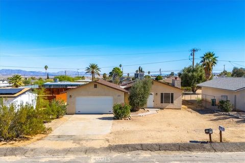 Photo of 5539 Lupine, 29 Palms, CA 92277 (MLS # JT25258632)