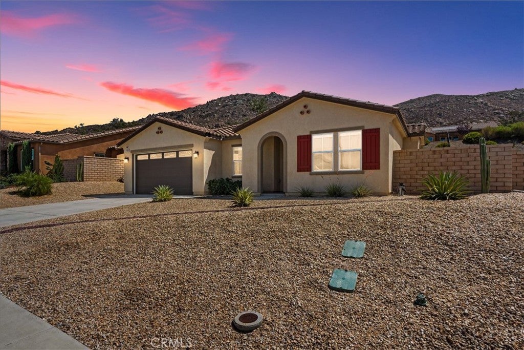 Photo of 10380 Prospector Lane, Moreno Valley, CA 92557 (MLS # IG26218546)
