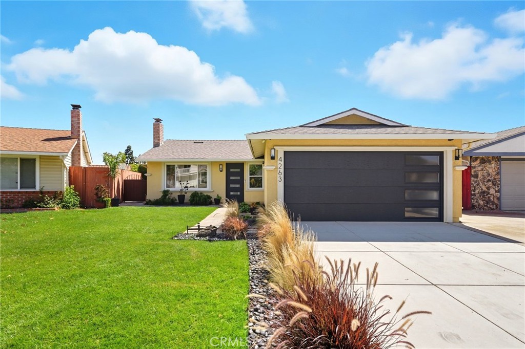 Welcome to this beautifully updated 1440 sq ft, 3 bedroom, 2 bath home with a JADU office in highly desirable Union City, offering easy access to shopping, top-rated school districts, Silicon Valley, and Highway 880. Perfectly situated on a spacious lot with room to expand, this home is a must-see with too many features to list! Step inside to a bright, inviting interior with waterproof laminate flooring and large windows that fill the home with natural light. The kitchen is a chef's delight with under-cabinet lighting, quartz countertops, solar prism skylights, modern stainless steel appliances, and thoughtful updates throughout. Both bathrooms have been fully remodeled with designer finishes including a custom-built vanity with extended roll-out drawers, a built-in medicine cabinet wall, new tile, countertops, mirrors, and fixtures. Additional highlights include a permitted attached sunroom for relaxing or entertaining, a modern keyless entry front door with matching garage door, a brand-new 25-year roof and heater (2024), and whole-house recessed lighting with dimmer switches. With its many upgrades, smart design, open and airy feel and move-in ready condition, this Union City treasure combines comfort, style, and functionality ready to welcome its next owner...YOU
