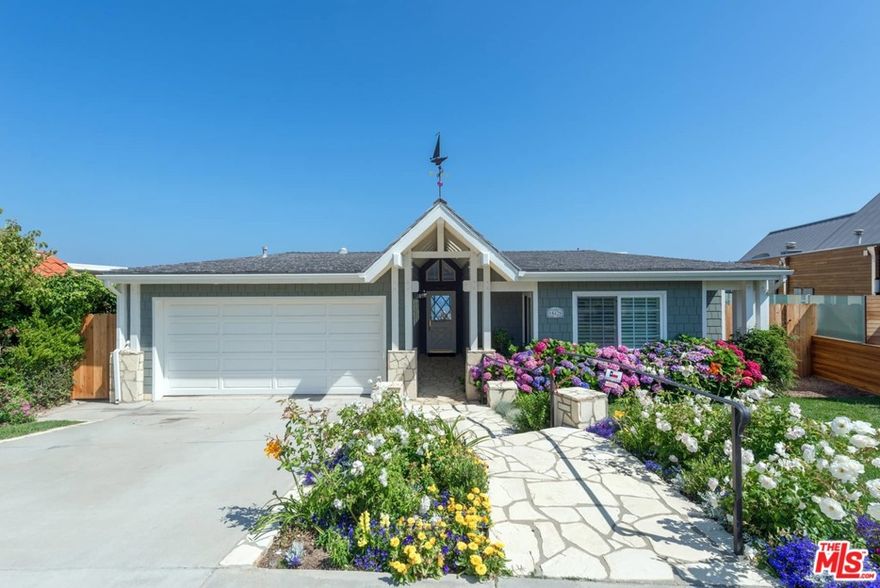 You will not find a home with more dramatic whitewater and sandy beach views! This Traditional single level home offers panoramic ocean views encompassing Palos Verdes, Catalina and the Santa Monica Bay Queen's Necklace to Malibu. The open floorpan offers opportunities for gracious entertaining both inside and out. The spacious living room has a wood burning fireplace and soaring, open beamed ceiling and opens to the dining room, both with captivating ocean views from sunrise to sunset. The large kitchen has granite counters, extensive shelves and cabinetry and an adjoining family room area. Wake up to blue water views from the master suite with walk-in closet and large bath. Two additional guest bedrooms share a bath. The rear yard includes an expansive patio for dining and entertaining in addition to a grassy lawn.