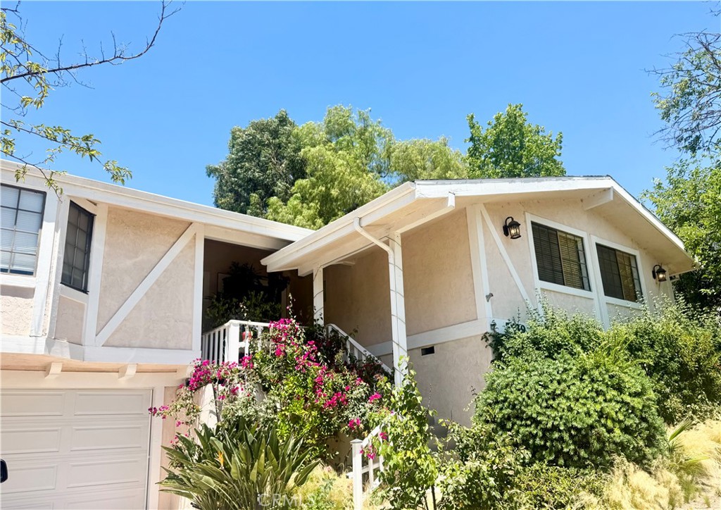 Welcome to this Old Agoura rental on a spacious, horse-zoned lot! This 4-bedroom, 3-bathroom home includes a bonus room, a separate family room, and a dedicated laundry room. Enjoy outdoor living with a beautiful gazebo and a fully equipped outdoor kitchen, perfect for entertaining. Ideal for those seeking space, comfort, and a unique, equestrian-friendly lifestyle.