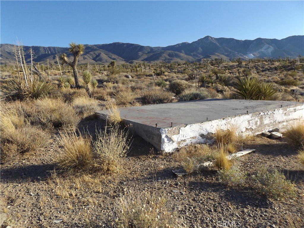 Situated just south of the railroad tracks, this five acre parcel has some of the best views that Lucerne Valley has to offer! Not only of the sprawling valley below it, but also of the Big Bear mountains behind it. There is plenty of room for off-roading and hiking during the day, along with breathtaking views of the stars at night, making this the perfect spot for camping or building an off-the-grid home. There was once a cabin on this parcel, however now only the concrete foundation and possibly a septic tank remain. If peace and quiet are what you are looking for, you can definitely find it here! There are some homes in this area, leaving you feeling secluded but not completely isolated. Please note that many of the roads in this area can be rough, but a high profile vehicle should be enough to get you there.