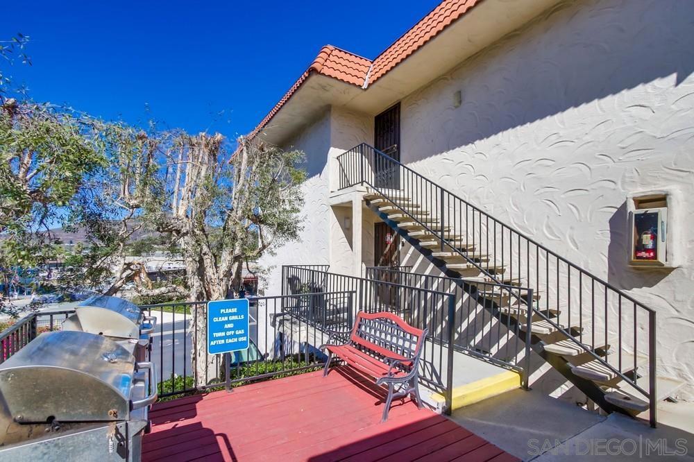 Beautifully updated top floor end-unit condo with views of Cowles Mountain in desirable San Carlos! Experience the best of Lake Murray living in this stunning and spacious 2-bedroom, 2-bathroom end-unit condo. Situated on the second story of the Casa Dorada complex, this highly desirable home offers tranquility and convenience, with many beautiful upgrades throughout. This updated 973-square-foot condo is ready for you to call home. As an end unit, the home receives an abundance of natural light. Enjoy cooking in the renovated kitchen, which features Granite countertops, newer cabinetry, and stainless steel appliances. Both bathrooms are also beautifully updated with newer vanities and tile showers. The interior features high-end laminate flooring, providing a modern and clean aesthetic. Step out onto your spacious balcony to enjoy your morning coffee or afternoon tea with serene views of Cowles Mountain. The master bedroom includes a custom closet organizer and dual sinks in the master bathroom for a more spacious and organized feel. The Casa Dorada complex offers resort-style amenities, including a sparkling swimming pool, relaxing spa, and BBQ area. The condo comes with two reserved tandem carport parking spaces and additional storage.