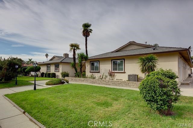Discover the comfort and convenience of this beautifully remodeled 2-bedroom, 1-bathroom ground floor apartment located in an 8-unit garden-style complex directly across from the Westfield Shopping Center in Arcadia. Within the prestigious Arcadia School District, this home features a spacious living room with a cozy fireplace and an open kitchen to the living room with a counter, newer cabinets, granite countertops, and a generous pantry. The newly remodeled bathroom includes dual sinks and a walk-in shower. Additional amenities include central air and heat, a community laundry room, and a 1-car carport. One-year minimum lease required; no pets & no smoking policy.