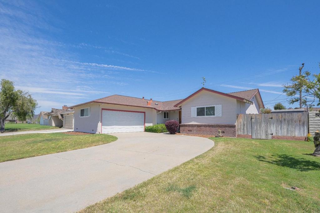 Welcome to this inviting 4-bedroom, 2-bath home situated in the heart of vibrant South Salinas and centrally located. First time on the market in over 60 years. This floor plan was designed with comfort and versatility in mind, featuring two bedrooms and a full bath on each side of the home, making it ideal for multi-generational living or simply providing the privacy and space todays lifestyle demands. At the center, you will find a cozy living room, functional updated kitchen with stainless steel appliances, dining/family room, a great layout for everyday living and entertaining alike. Enjoy the fully fenced backyard, ready for your garden dreams or gatherings with friends and family. The home also boasts charming curb appeal and a spacious two-car garage. Bring your personal touch and make this house your home!