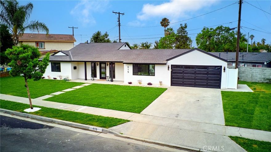 Welcome to 615 S Hazelwood Street, a fully reimagined Anaheim residence offering modern living with timeless appeal. This stunning single-family home has been completely renovated inside and out, showcasing an open-concept layout with natural light, premium finishes, and a seamless flow ideal for both entertaining and everyday comfort.



The designer kitchen features custom cabinetry, quartz countertops, stainless steel appliances, and a large island that anchors the living space. The home offers three spacious bedrooms and two beautifully updated bathrooms, including a primary suite with a private ensuite and direct access to the backyard.



Every detail has been thoughtfully upgraded, from new flooring, recessed lighting, windows, and doors to updated electrical, plumbing, and HVAC systems. Outside, enjoy a private backyard perfect for entertaining, relaxation, or expanding living space with an ADU.



Located minutes from Disneyland, shopping, dining, and major freeways, 615 S Hazelwood Street delivers a rare blend of quality, design, and convenience in one of Anaheim’s most established neighborhoods.