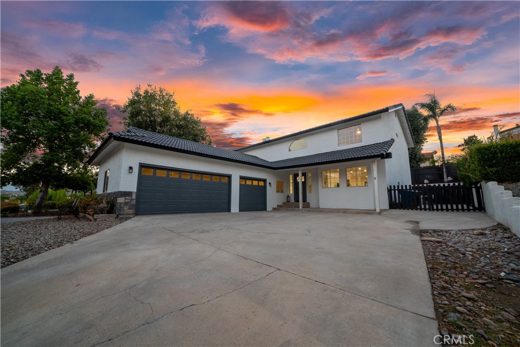 Welcome home to this stunning property in the highly sought-after Canyon Lake community! This beautifully remodeled, TURNKEY 4-bedroom, 3-bath home with a 3-car garage has been exquisitely updated from top to bottom.
Step inside to a bright and airy open layout featuring a spacious living room, family room, kitchen, and dining area. A striking wood-burning fireplace serves as the focal point of the living room, creating the perfect setting for cozy nights or elegant entertaining. Freshly painted walls, new flooring, stylish color palettes, recessed lighting, and modern finishes flow seamlessly throughout the home.
The brand-new kitchen is a chef’s dream—complete with a sleek bar-top peninsula, new cabinets, gorgeous quartz countertops, a wine fridge, and stainless-steel appliances. Whether hosting a dinner party or preparing a family meal, this space makes cooking and entertaining a joy. The family room, located next to the dining room, provides extra space for gatherings—perfect for enjoying quality time together or entertaining guests.
Also on the main floor, you’ll find a convenient powder room for guests and a well-appointed laundry room for everyday ease.
All four bedrooms are generously sized, with two fully remodeled bathrooms upstairs. The primary suite features a walk-in closet, en-suite bath, and a private balcony—perfect for morning coffee or evening relaxation—overlooking the backyard pool and scenic hillside views.
Your outdoor oasis includes a sparkling pool and spa, along with a covered patio ideal for dining al fresco, entertaining guests, or simply enjoying the Southern California sunshine.
Located within Canyon Lake’s 24-hour guard-gated community, you’ll enjoy resort-style amenities including a private 525-acre lake with premiere wakeboarding and waterskiing, an 18-hole SCGA-rated golf course, lakefront pool and clubhouse, RV park, equestrian center, tennis, pickleball, and basketball courts, baseball fields, 4 beaches, 9 parks, an amphitheater, boat docks, a bicycle pump track, senior center, exclusive restaurants, over 40 clubs, and so much more.
Don’t miss the chance to make this dream home yours!