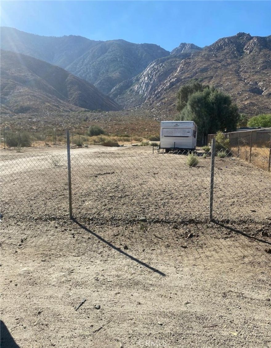 Wonderful, clean and fenced in lot ready for building or bringing a manufactured home in on. Close to utilities and in an emerging neighborhood. Please call for any further details.