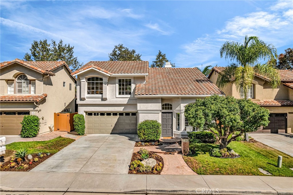Welcome to this beautiful home with sunset views in the highly desirable Laguna Audubon community of Aliso Viejo. This tastefully designed single-family home features 4 bedrooms, 2.5 bathrooms, and 1,754 sq. ft. of bright, comfortable living space. Perfect for both everyday living and entertainment, featuring soaring cathedral ceilings, an inviting fireplace in the family room, designer paint throughout, tile flooring downstairs, and engineered wood upstairs. The kitchen and bathrooms showcase granite countertops, while the spacious primary suite offers a private en-suite bath and a generous walk-in closet. Sliding glass doors from the breakfast nook open directly to a private backyard retreat—an ideal setting for morning coffee, weekend barbecues, or simply unwinding at the end of the day. Additional upgrades include a freshly painted exterior, vinyl fencing, re-piping throughout the home and a Tesla Wall Connector. A short drive away from Laguna Beach, renowned for its Festival of Arts and the world-famous Pageant of the Masters. Near Aliso Viejo Country Club, Soka University, Aliso Viejo Town Center, medical facilities, hiking and biking trails, shops, restaurants, and lively community events at Grand Park. Convenient access to 73 Toll Road, 133 Hwy, 5, and 405 freeways. This is more than just a home—it’s a lifestyle! The perfect blend of comfort, style, and location.