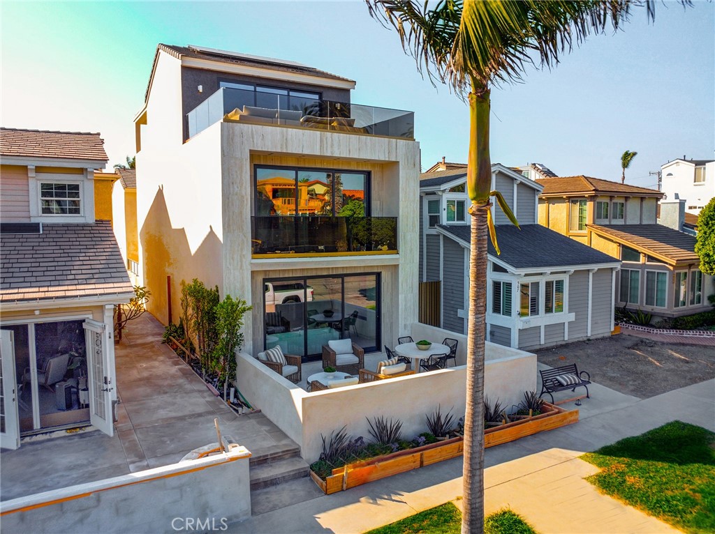 Experience the pinnacle of coastal elegance in this stunning brand-new beach estate, perfectly situated in the heart of Downtown Huntington Beach. Encompassing 2,857 square feet, this meticulously designed residence harmoniously blends sophisticated style with high-end functionality.
Featuring three luxurious en-suite bedrooms, a spacious family lounge, and a remarkable third-floor luxury suite with an expansive deck, this home is ideal for modern living and entertaining. The expansive great room invites the refreshing coastal breeze through wide LA Cantina doors, showcasing sleek porcelain flooring and striking custom tilework.
The chef’s kitchen is a culinary delight, boasting a grand island with Calcutta Turquoise countertops, an Onyx Velluto backsplash, and premium appliances. The primary suite offers a serene retreat, complete with a private balcony, spa-inspired bathroom, and a custom walk-in closet.
Additional highlights include a finished two-car garage with epoxy flooring and dual rooftop decks featuring breathtaking views. Don’t miss this opportunity to embrace luxurious coastal living in your dream home!