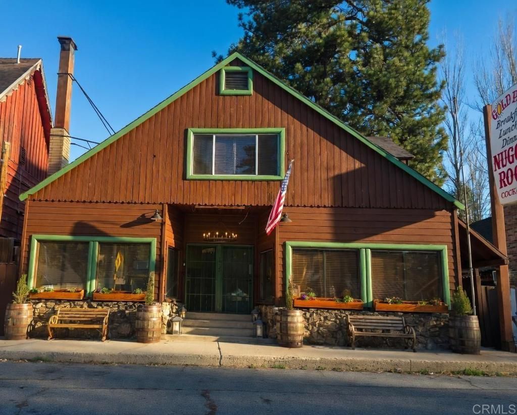 Photo of 39204 N Shore Drive, Fawnskin, CA 92333 (MLS # PTP2602919)