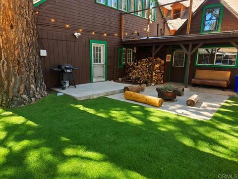 Photo of 39204 N Shore Drive, Fawnskin, CA 92333 (MLS # PTP2602919)