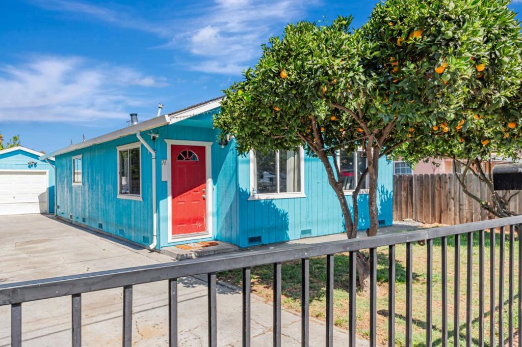 Welcome to this charming 3-bedroom, 1 and 1/2 bathroom home located in the vibrant city of San Jose. Boasting a cozy 756 square feet of living space, this residence offers a functional layout perfect for modern living. The kitchen provides ample space for meal preparation and dining, ideal for both casual and formal gatherings. Enjoy the warmth of the separate family room to relax and unwind after dinner. The home features Central AC and Heating, ensuring a cool and comfortable environment during warm months and a cozy ambiance during the winter. With flooring throughout, maintenance is a breeze, allowing for easy upkeep. The convenience of an in-home laundry setup adds to the practical appeal of this property. Situated on a lot of approximately 4,346 square feet, this property offers outdoor space for relaxation or potential landscaping projects. Fenced/gated front yard features a grass lawn and 2 healthy orange trees. Back yard features fully paved 1 year old concrete with plenty of room to furnish, BBQ, and relax. A detached 1-car garage, 3 car driveway and paved side yard ensure that your parking and storage needs are well-accommodated. Both the home and the garage have 3 year old roofs. Don't miss the opportunity to make this delightful San Jose home yours.