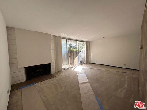 Photo of 833 Moraga Drive #18, Los Angeles, CA 90049 (MLS # 25618281)