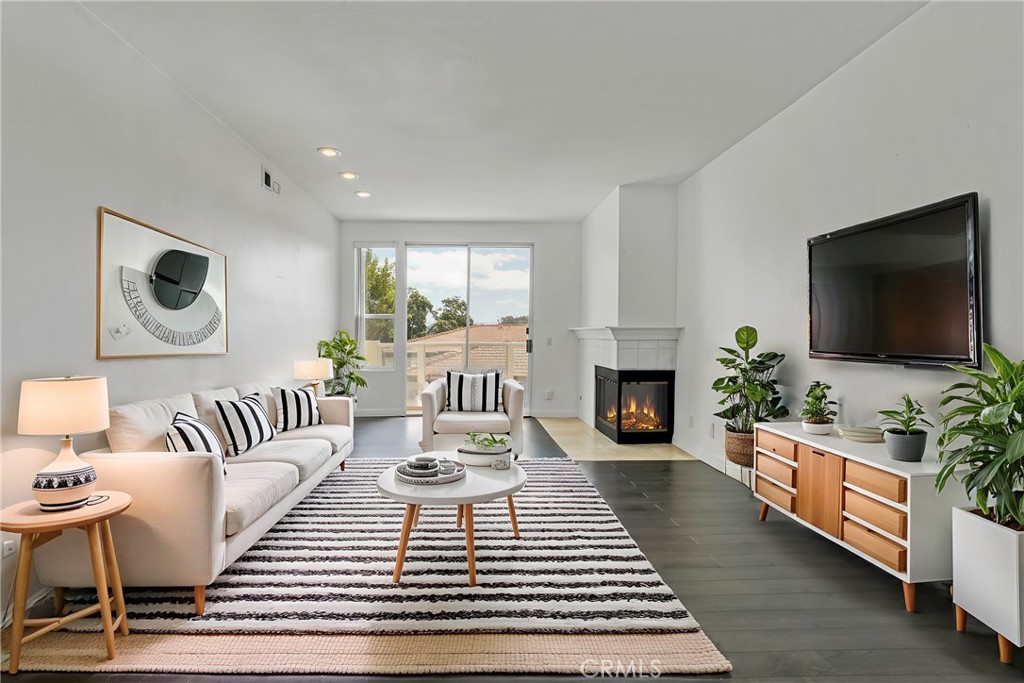 Wake up to panoramic views in this elegantly refreshed condo in the desirable La Vista community of Laguna Niguel—just minutes from the beach. This move-in-ready 1-bedroom, 1-bath home offers the perfect blend of style, comfort, and coastal convenience.
Enjoy laminate flooring throughout, a spacious, sunlit living room with a cozy fireplace, and a private balcony that captures sweeping views—ideal for morning coffee or evening sunsets. The updated kitchen features quartz countertops, soft-close cabinetry, and high-end stainless-steel appliances, including a brand-new Samsung Bespoke French Door Smart Refrigerator with AutoFill Water Pitcher.
The bedroom includes a walk-in closet, and the in-unit laundry comes equipped with front-loading washer and dryer on pedestals for extra storage. An attached garage leads directly into the unit, providing secure and private access—perfect for safe vehicle storage and daily ease.
Resort-style community amenities include a sparkling pool, spa, clubhouse, fitness center, BBQ areas, and a car washing station. Ideally located just three (3) miles from the beach and close to golf, shopping, restaurants, and scenic walking and biking trails. Nearby paths connect to Salt Creek Beach, the Ritz-Carlton, Waldorf Astoria, and Dana Point Harbor.
Rarely available in this location and price point—don’t miss your opportunity to live the Southern California lifestyle in La Vista.
*One or more photo(s) in this listing have been virtually staged.