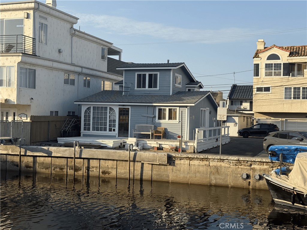 FIXER FIXER FIXER Perfect remodeling opportunity or rebuild with new plans to your preference. Sea Wall recently rebuilt and owner to install boat dock for all the toys. The property has been gutted and cleared out just waiting to be brought back to life. The location on Bayview is not only on the canal with water access but a quick walk across PCH to the white sandy beaches of Sunset Beach - not to mention good'ol classic Captain Jacks restaurant in wait for appetizers, dinner and drinks. The current floor plan has provision for a kitchen, dining, living room and half bath on ground level. Upstairs is the master bedroom with 2 substandard small bedrooms. 1 step below 3/4 bath, washer/dryer hookups and 1 car garage. A nice feature is the fact that it has a existing front yard space if desired facing the canal. A diamond in the rough that needs to be polished. Hard to find these opportunities in the Harbor anymore. Buy it for the kids to keep them close in the neighborhood. Enjoy all the benefits of the harbor and coastal living. An opportunity to make it your own.